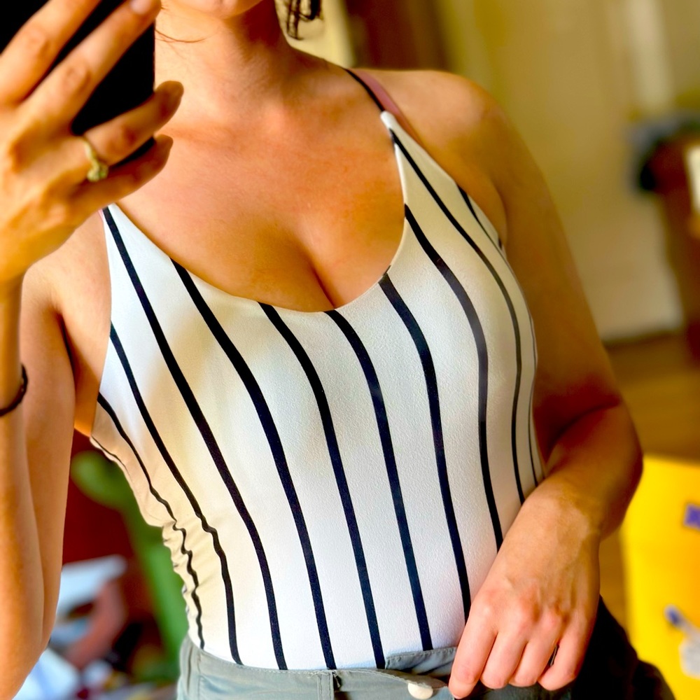 Striped black & white bodysuit, size M.